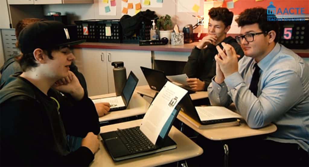 Students working in a group in class
