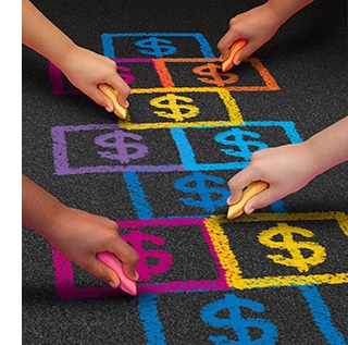 A group of children drawing a hopscotch game on a floor with dollar signs.