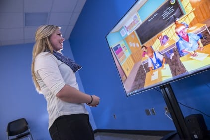 Teacher using TeachLive virtual classroom